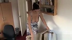 Making bed with boobs out
