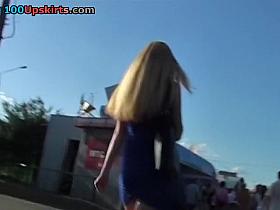 Lengthy-haired sweetheart in street upskirt movie scene