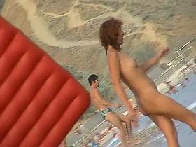 My beach voyeur video of horny milfs and teen girls playing in the water