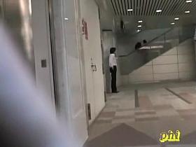 Amateur boob sharking in an underground shopping center