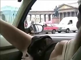 Girl flashes in moving car