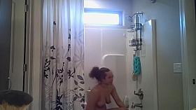 Busty Woman Gets Spied On In Her Bathroom Going For A Shower