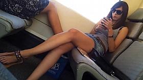 Candid sexy legs on the train