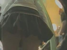Hot black hair whore in a slutty skirt gets her crotch videoed