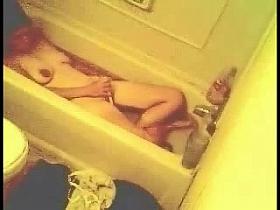 Mum rubbing her pussy in bath tube