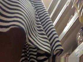 Woman in black and white stripes no panties