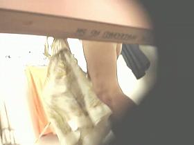 Candid asses and legs voyeured on dressing room camera