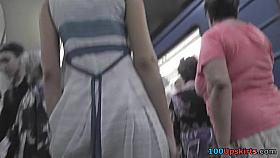 Gal in a-line skirt flashes g-string in upskirt vid