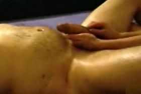 Asian woman enjoys tugging hard on a throbbing dick