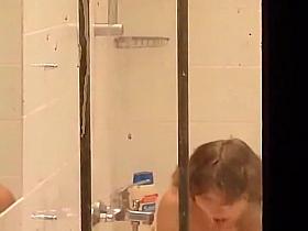 Mature lady peeped on in a bathroom