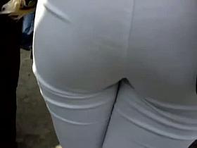 Candid street vid of a juicy ass in tight white pants