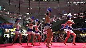 Sexy girls in short skirts dancing for the crowd
