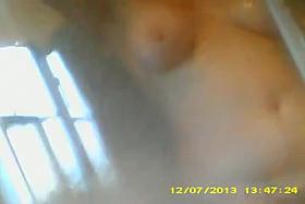 Mature wife's big tits in the shower