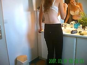 hot woman being spied on in the bathroom