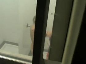 Office maid spied during a shower