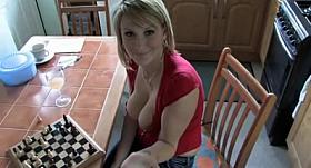 Downblouse Playing Chess three