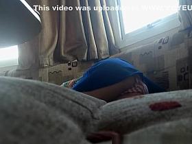 Girl lies down in couch upskirt