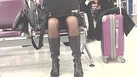 blond business woman upskirt at airport