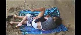 Beach candid camera shows slut having sex