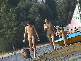 Nude beach spy camera with a sexy couple in focus