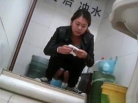 Asian girl in tight jeans pants peeing