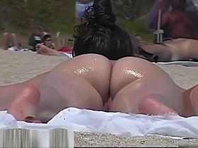 Amazing nudist girls on a hidden beach voyeur vid