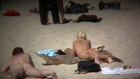 Blonde kinky girl is so sexy looking on this beach