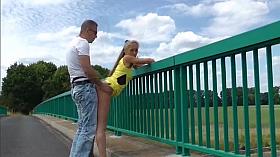 Couple on motorway bridge