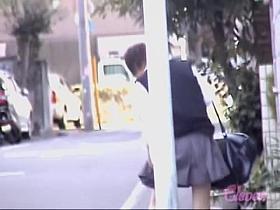 Cute Asian school-babe skirt sharked by a passerby.