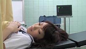 Noisy oriental schoolgirl getting fingered by her doctor on the medical bed
