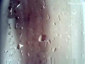 Tight asian body in shower