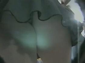 Voyeur vid of a thick white girl in a dark green skirt and thong