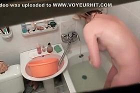Hot woman washes in the bathtub