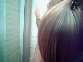 Young shaved pussy filmed in a public wc