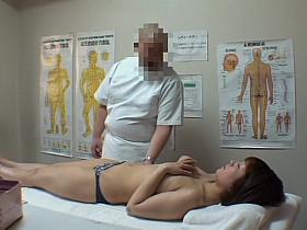 Big booty Japanese caught in a voyeur massage video