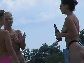 The topless amateur girls got on the voyeur beach cam