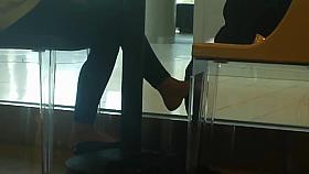 Candid Shoeplay Dangling Feet in Coffee Shop