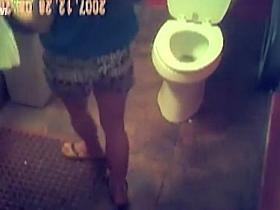 Nice girl in sandals takes a piss