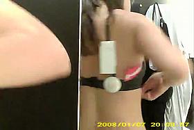 Dressing room hidden cam - Topless brunette with big boobs