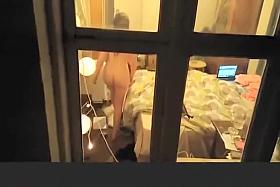 Voyeur spies teen through her bedroom window
