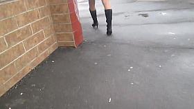 Black boots and tan stockings upskirt