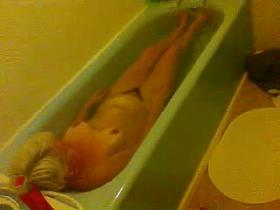 unaware mature wife in bath