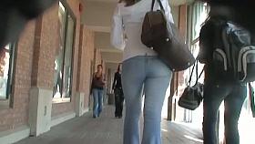 Cutie in tight jeans flaunts her ass in a hot candid street video