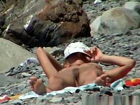 Small boobs nudist woman sunbathing her tight body