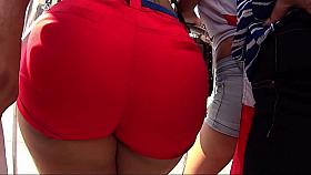 INSANE ASS IN RED SHORTS