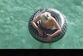 Hot ass blonde playing in the water