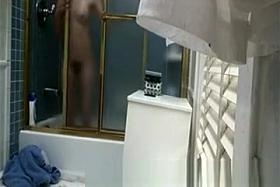Brunette girl caught in bathroom by spy cam