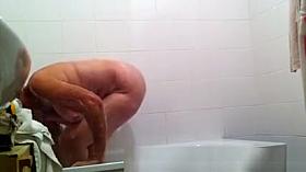 Granny spied in bath tub