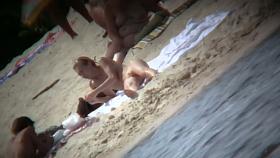 Naked mature babe captured by voyeur nudist beach
