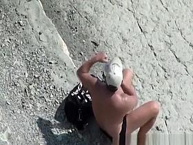Nudist couples fucking in rocky beach